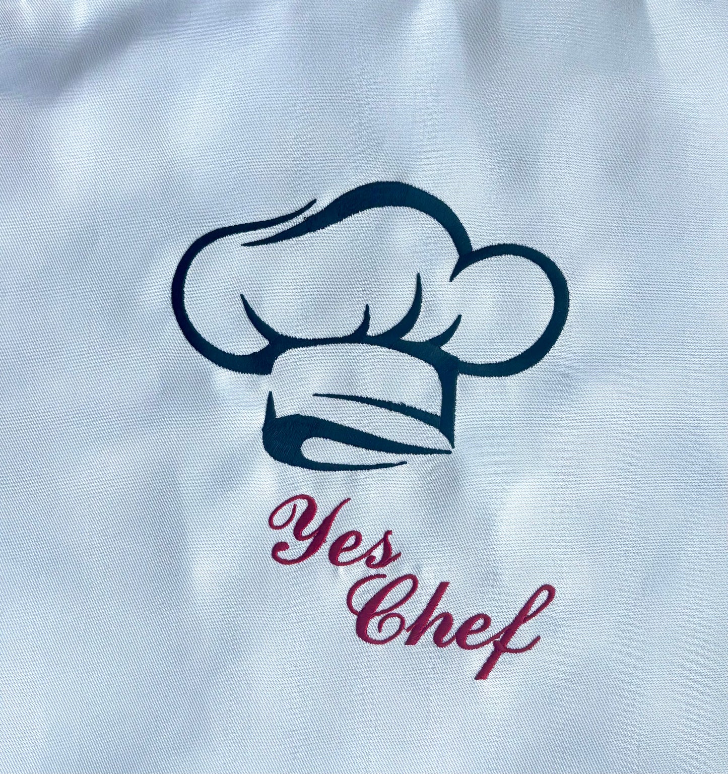 Embroidered White "Yes Chef" Apron with Adjustable Neck Strap and Front Pockets